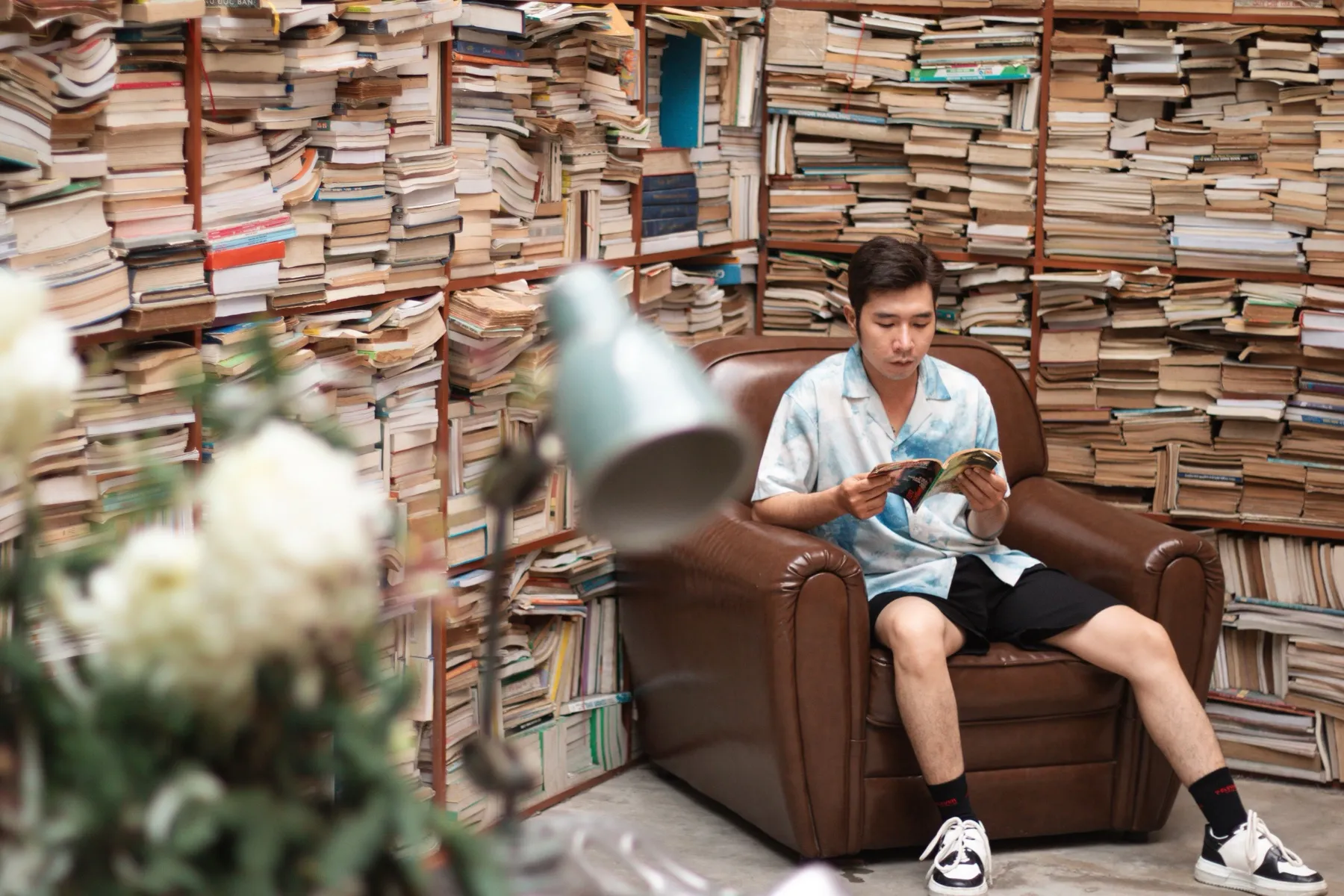 A person reading, focused and calm.